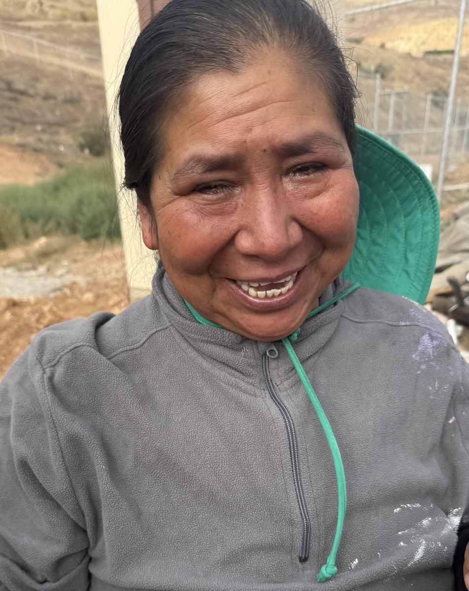 A Tecate woman smiling