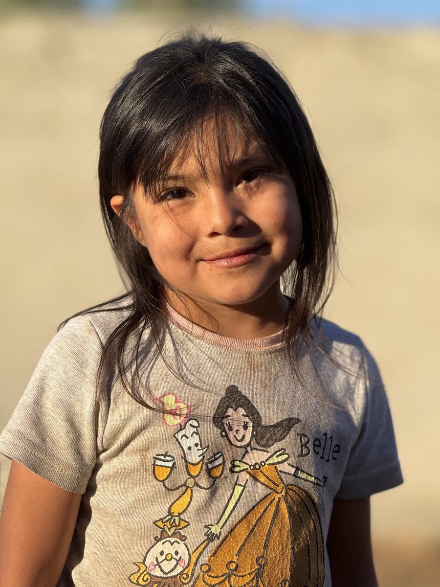 A young Tecate girl smiling